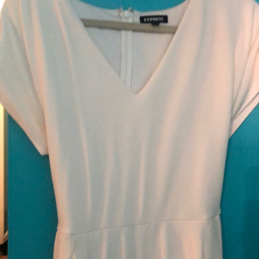 Cream jumpsuit with pockets and tieback